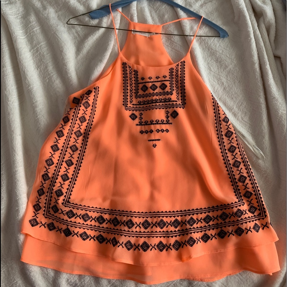 Orange tank with navy design